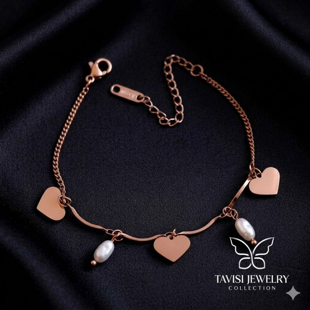 Rose Gold Heart Pearl Charm Bracelet with multiple heart charms on white background - Tavisi Jewelry Collection