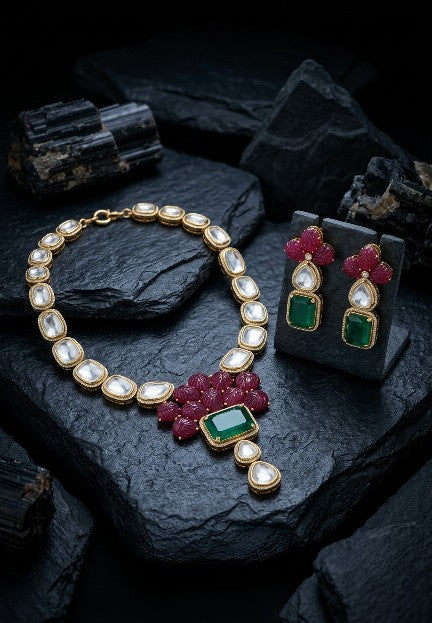 Premium brass ruby floral and emerald green Kundan statement necklace front view.