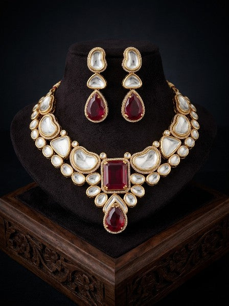 Premium brass ruby red AD Kundan statement necklace front view.