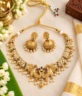 Shriya Antique Gold Matte Kundan Pearl Necklace Set with elephant motif and Jhumka earrings