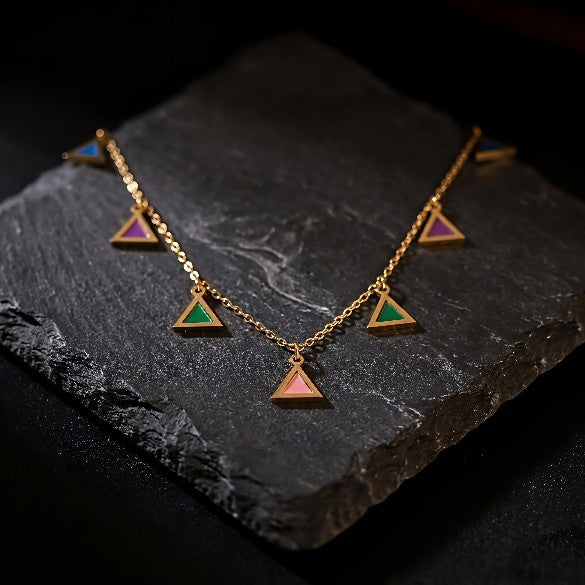 Close up of Tavisi Alina Prism colorful  tanmaniya charm necklace, waterproof and long lasting gold plated jewellery