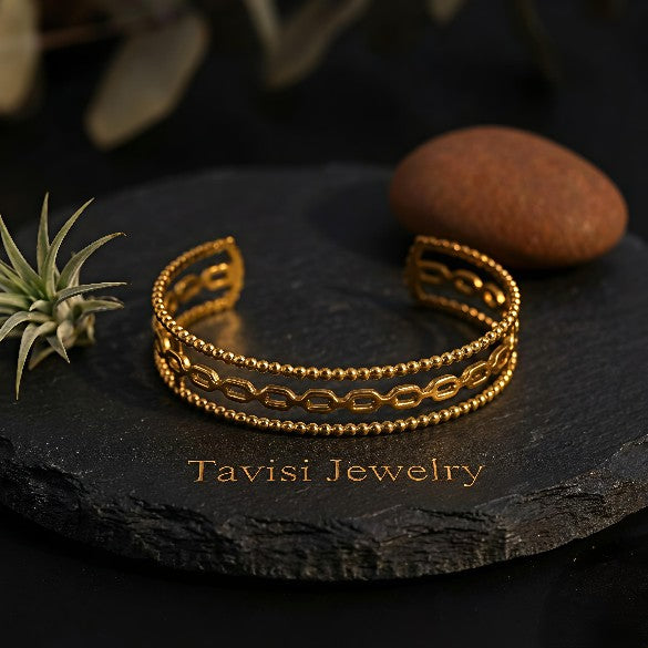 Front view of Tavisi Aurelia 18K gold plated anti tarnish cuff bracelet crafted in premium 316L stainless steel for women