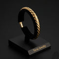 Tavisi Aurelia Twist 22K gold plated anti tarnish 316L stainless steel kada bracelet for women