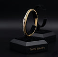 Tavisi Aurelia Wave gold plated AD stone anti tarnish bracelet on hand
