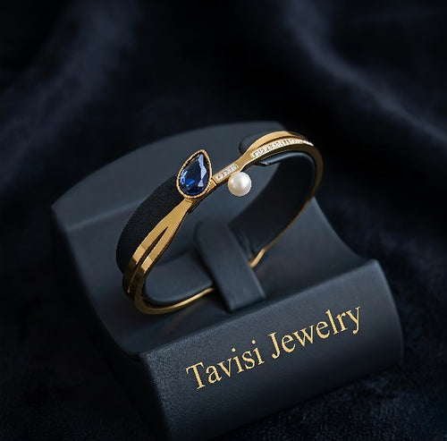 Tavisi blue pearl elegance kada in gold plated 316L surgical stainless steel with blue stone and pearl detailing, anti tarnish finish, spring lock design, size 2.4
