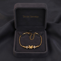 Tavisi Butterfly Charm Anti Tarnish Bracelet with gold butterfly centerpiece, zircon stone accents, 22K gold plated 316L surgical stainless steel and long lasting shine.