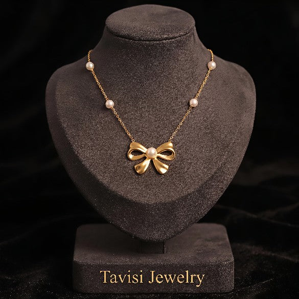 Tavisi Celina Bow Pearl Pendant Necklace with premium 316L Surgical Grade Stainless Steel and long lasting 18K gold plated finish