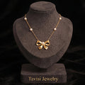 Tavisi Celina Bow Pearl Pendant Necklace with premium 316L Surgical Grade Stainless Steel and long lasting 18K gold plated finish