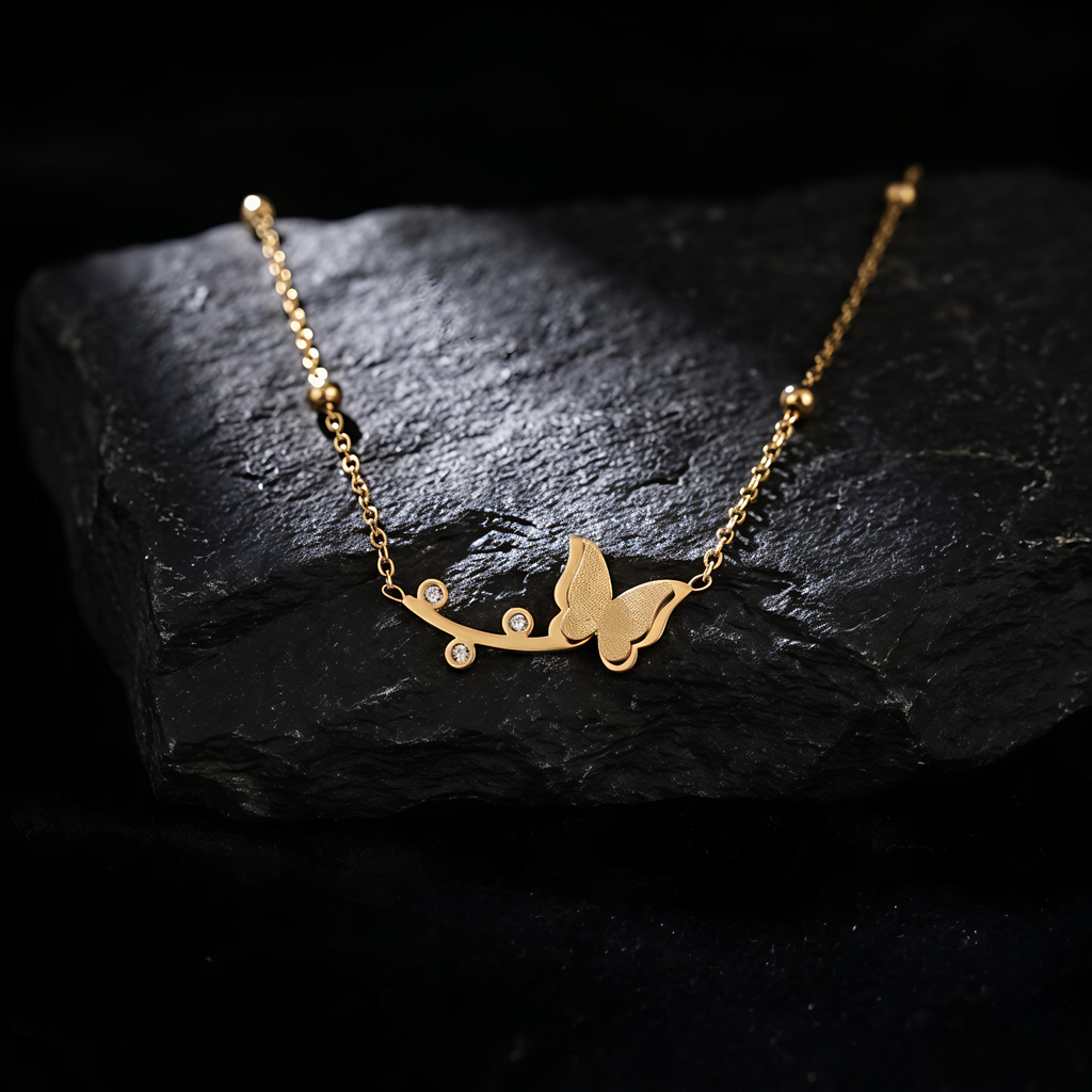 Close up of Tavisi Celina Butterfly Necklace with AD American Diamond stones, waterproof and long lasting gold shine