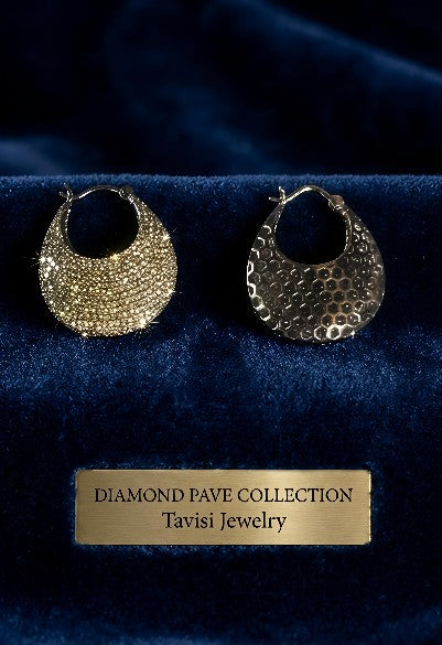 Tavisi crescent moon pavé hoop earrings displayed in premium luxury presentation