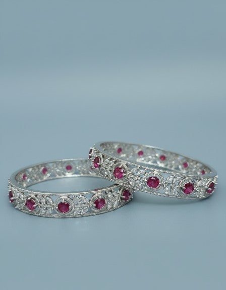 Front view of Tavisi Crimson Elegance ruby CZ silver polish bangle size 2.6 for women 