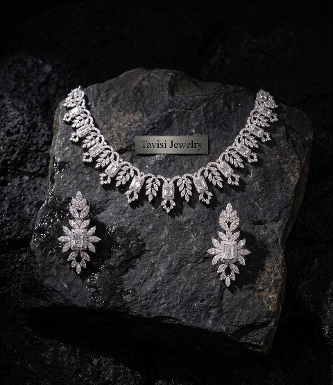 Woman wearing Tavisi Crystal Blossom AD CZ premium brass silver finish bridal necklace set