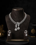 Woman wearing Tavisi Crystal Radiance AD CZ Premium Brass Silver Finish Necklace Set
