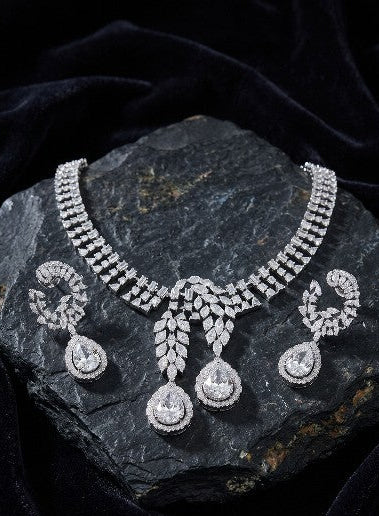 Female model wearing Tavisi Crystal Radiance AD CZ Statement Bridal Necklace Set
