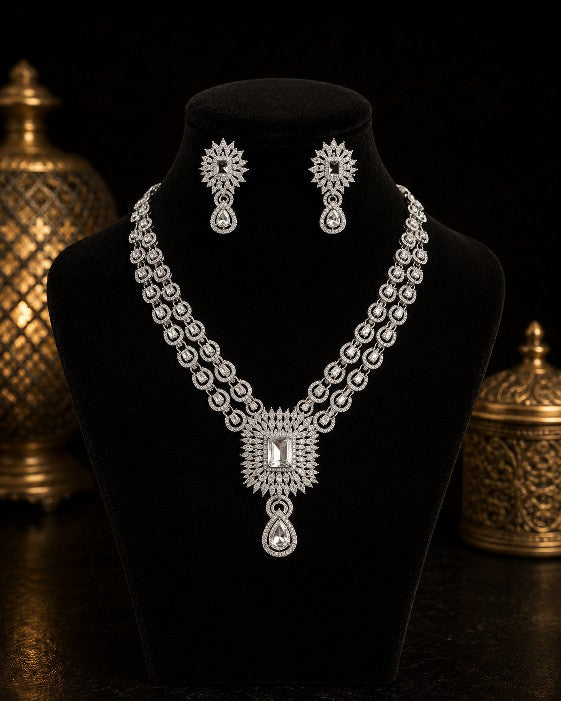 Woman wearing Tavisi Crystal Royale AD CZ Premium Brass Silver Finish Necklace Set