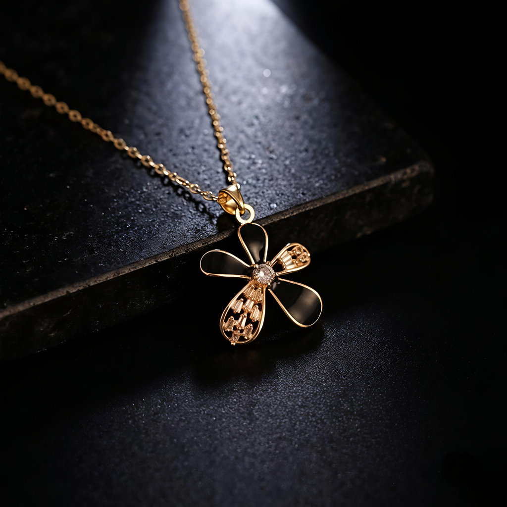 Close-up of Tavisi Elara Black Bloom Necklace featuring anti tarnish waterproof stainless steel with black floral pendant design