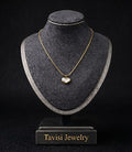 Tavisi Elara Heart Pendant Necklace featuring a gold plated heart design with elegant white detailing