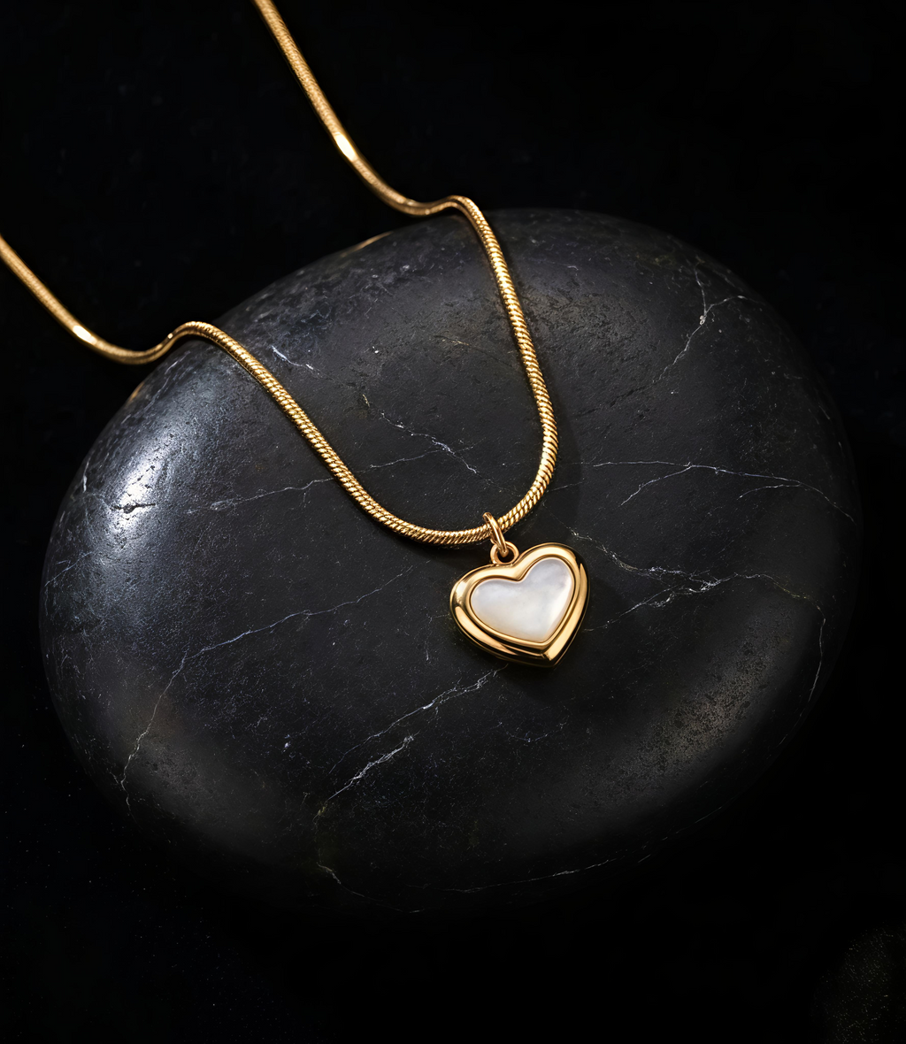 Model wearing Tavisi Elara Heart Pendant Necklace with anti tarnish gold plated finish and minimalist heart charm