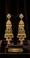Tavisi Elephant Motif AD Long Jhumki Earrings in Green and Pink featuring premium American Diamond stones and elegant pearl accents.