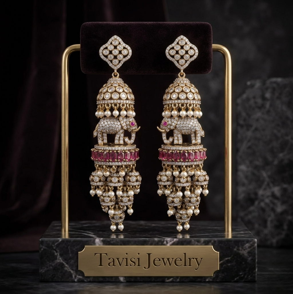 Tavisi Elephant Motif Kundan AD Long Jhumki Earrings in Pink featuring American Diamond stones, Kundan work and pearl detailing.