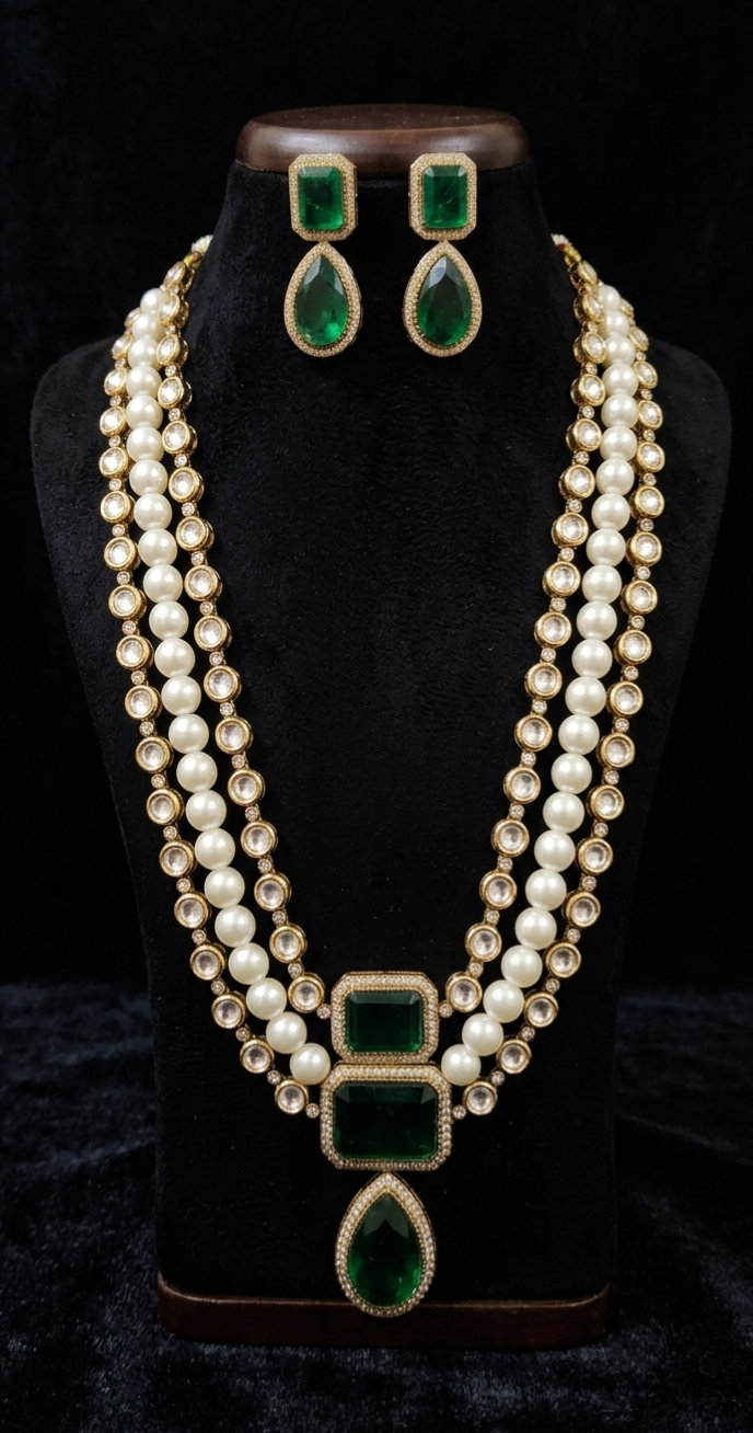 Front view of Tavisi emerald pearl moissanite kundan necklace set with white moissanite stones, emerald stones and pearl strands.