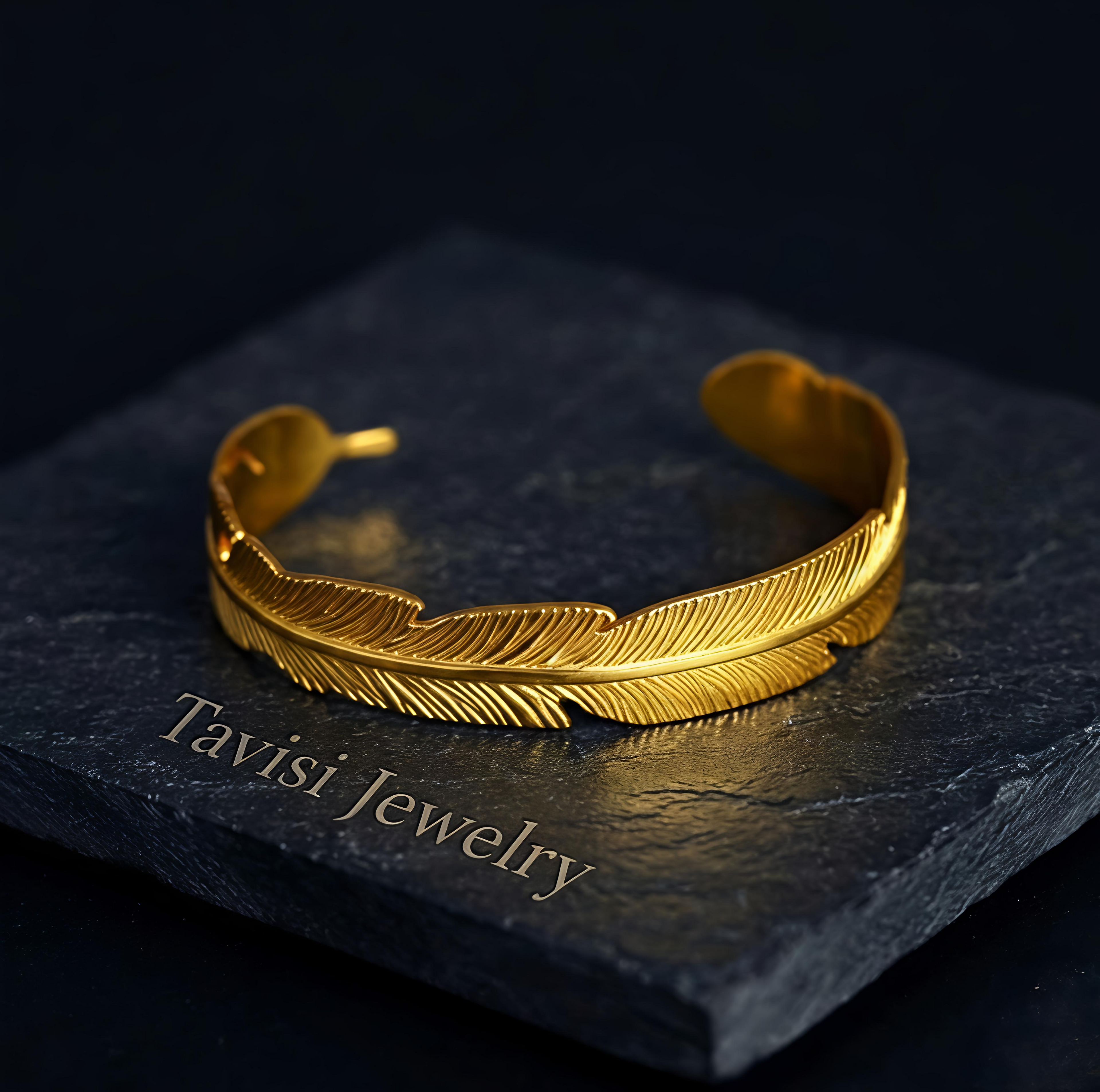 Premium Tavisi feather inspired gold plated cuff bracelet crafted in 316L surgical stainless steel with PVD coating
