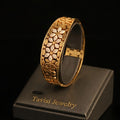 Tavisi Floral Mesh Gold Bracelet in 316L surgical stainless steel with 22K gold plated anti tarnish finish, sparkling CZ stone detailing, lightweight waterproof designer bracelet for women
