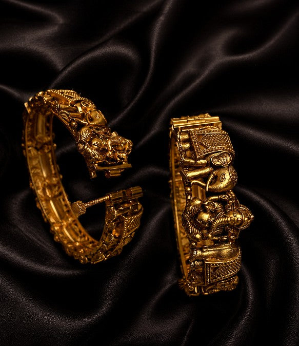 Tavisi Jewelry elephant and Ganesha brass open bangle with gold finish