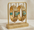 Front view of Tavisi Gajraj Heritage gold plated bangles with elephant motif detailing for women