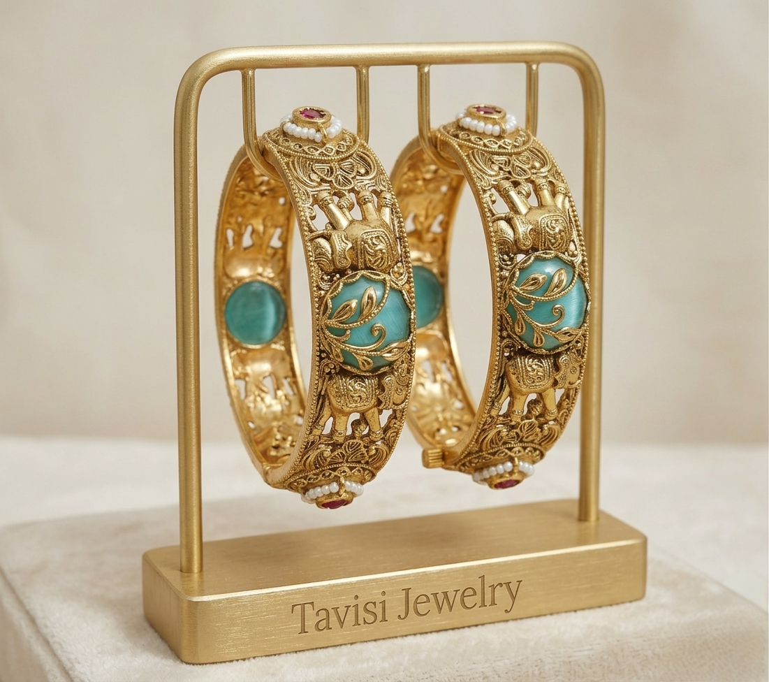 Front view of Tavisi Gajraj Heritage gold plated bangles with elephant motif detailing for women