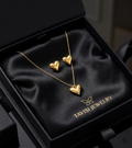 Tavisi Golden Heart Pendant Necklace & Earrings Set with elegant heart design 18K gold electroplated 316L surgical stainless steel anti tarnish waterproof long lasting jewellery model view 