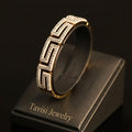 Tavisi Greek Pattern CZ Gold Bracelet in 316L surgical stainless steel with 22K gold plated anti tarnish finish, designer Greek pattern, sparkling CZ stones, lightweight waterproof design, size 2.4
