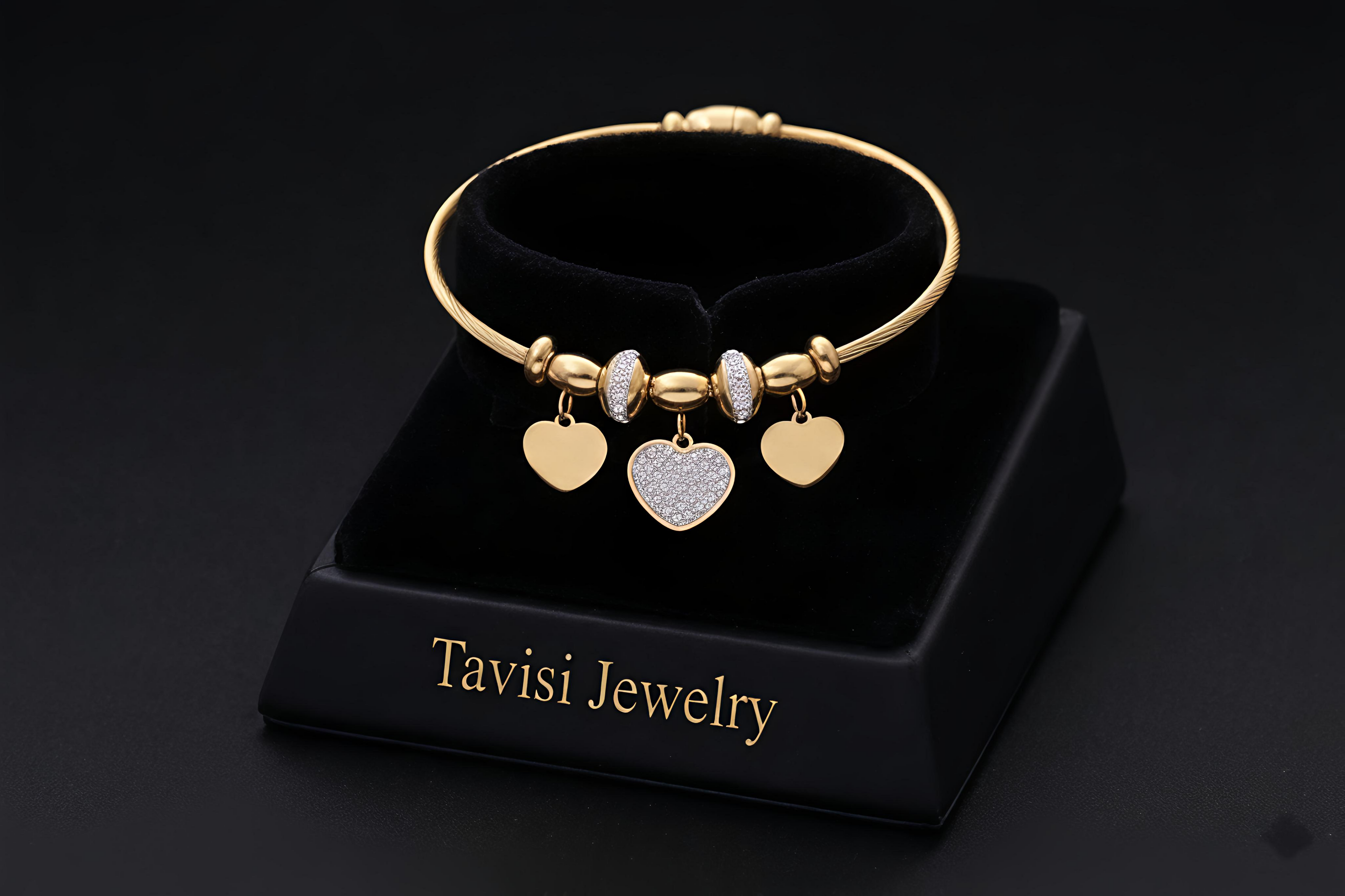 Tavisi Heart Charm Bracelet crafted in 316L surgical stainless steel with AD stones, 22K gold plating, waterproof anti tarnish finish and long lasting shine.