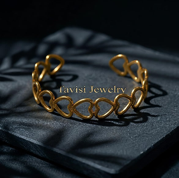 Front view of Tavisi Heartline gold plated anti tarnish heart bracelet crafted in premium 316L stainless steel for women