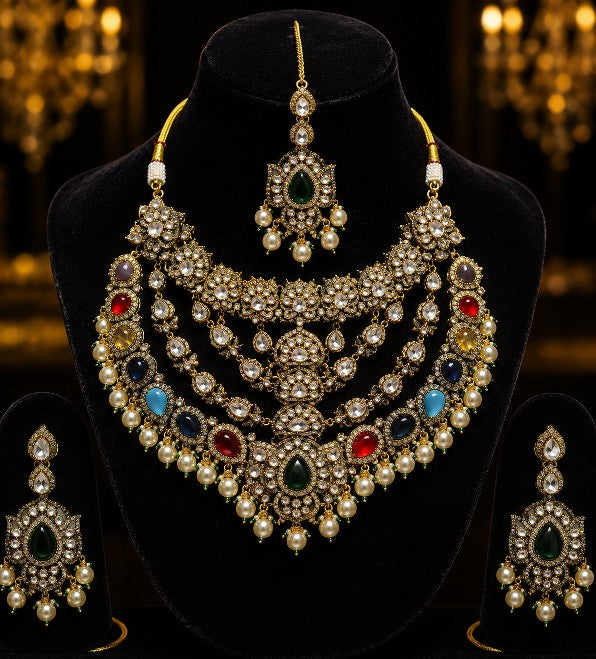 Tavisi imperial AD kundan bridal necklace set with multicolor stones, pearls, matching earrings and maang tikka front display.
