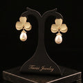 Tavisi ivory floral pearl drop earrings with 22K gold plating and anti tarnish finish for women