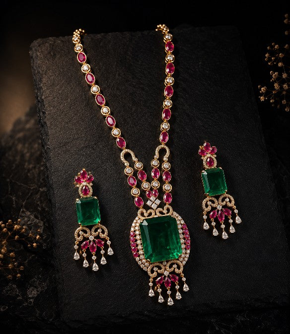 Close up of Tavisi long lasting brass casting necklace set with AD CZ Jardin Emerald green white and Rani Pink stones.