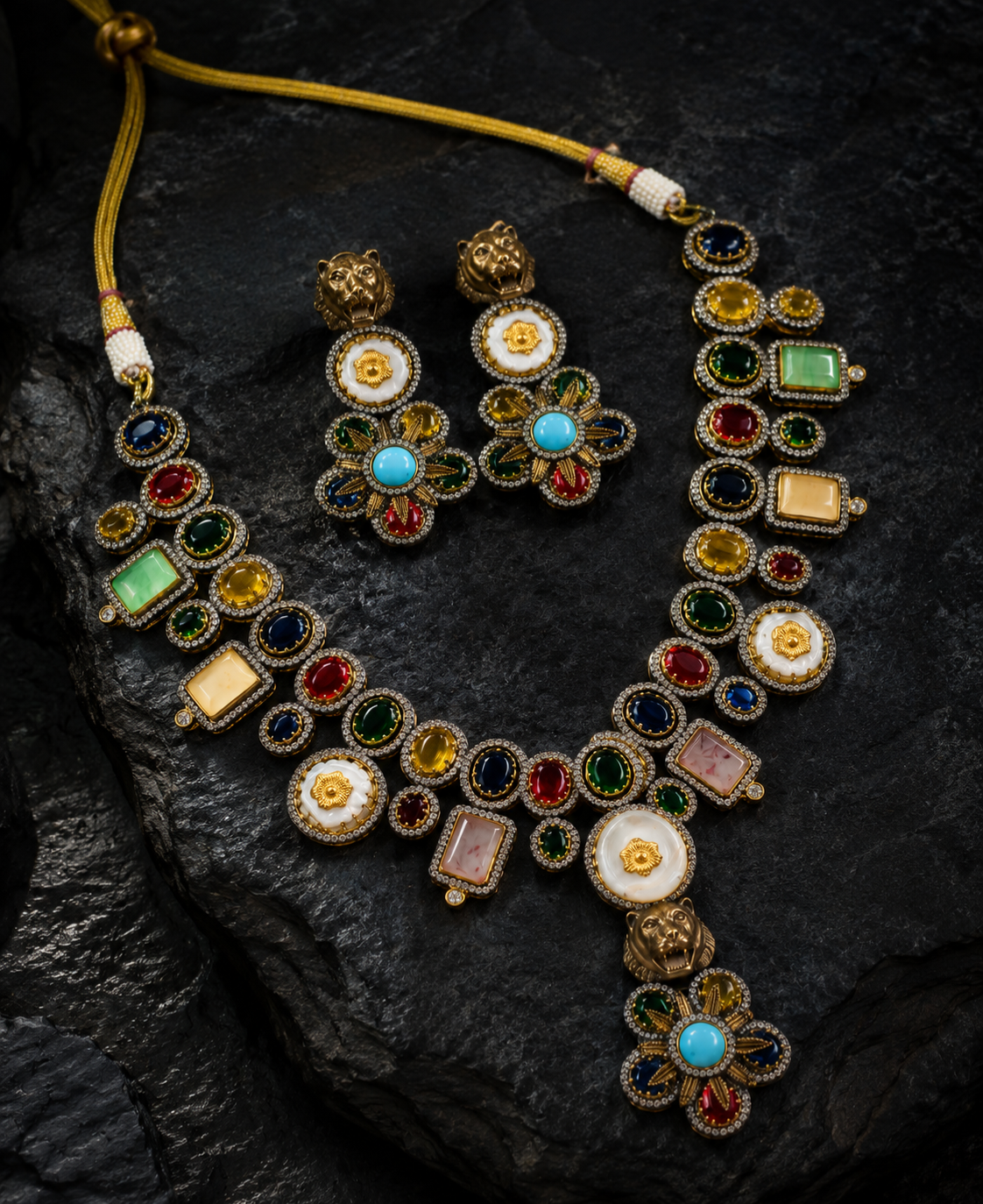 Close-up of Tavisi lion motif necklace set with white moissanite stones, multicolor kundan work and pearl detailing.