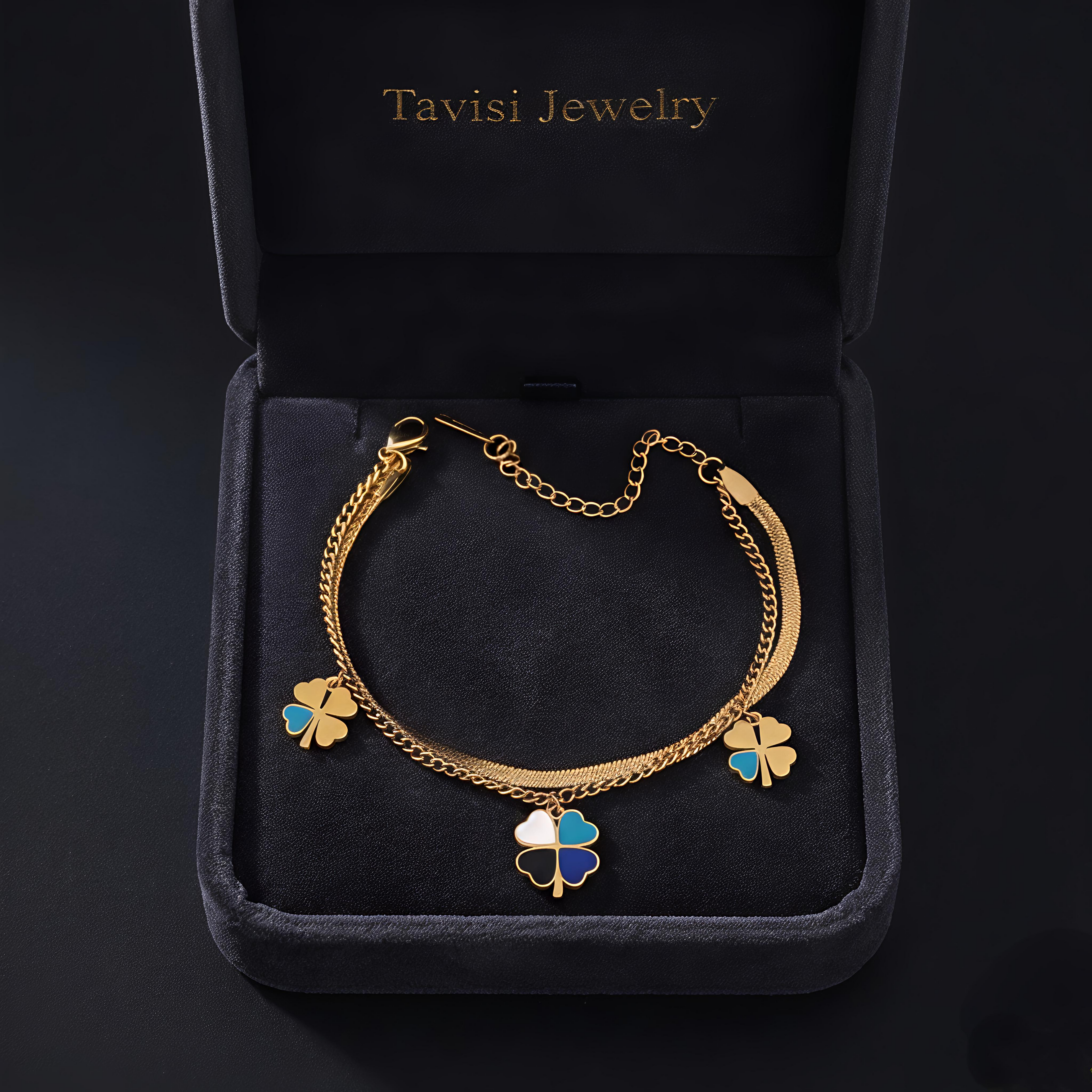 Tavisi Lucky Clover Charm Bracelet crafted in 316L surgical stainless steel with 22K gold plating, featuring colorful clover charms, dual chain design, waterproof anti tarnish finish and long lasting shine.