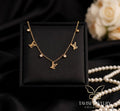Tavisi Luxe Letter Charm Tanmaniya Necklace with premium AD American Diamond stones 316L surgical stainless steel and 22K anti tarnish finish 