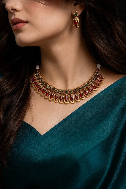 Designer Mengo necklace featuring ornate gold tone detailing and colourful stones