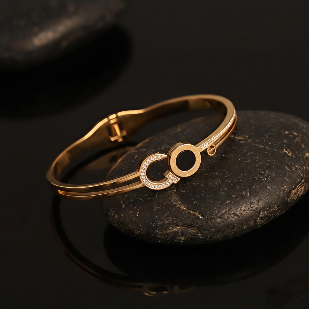 Tavisi Nora gold bracelet with black detail AD stones and long lasting waterproof finish