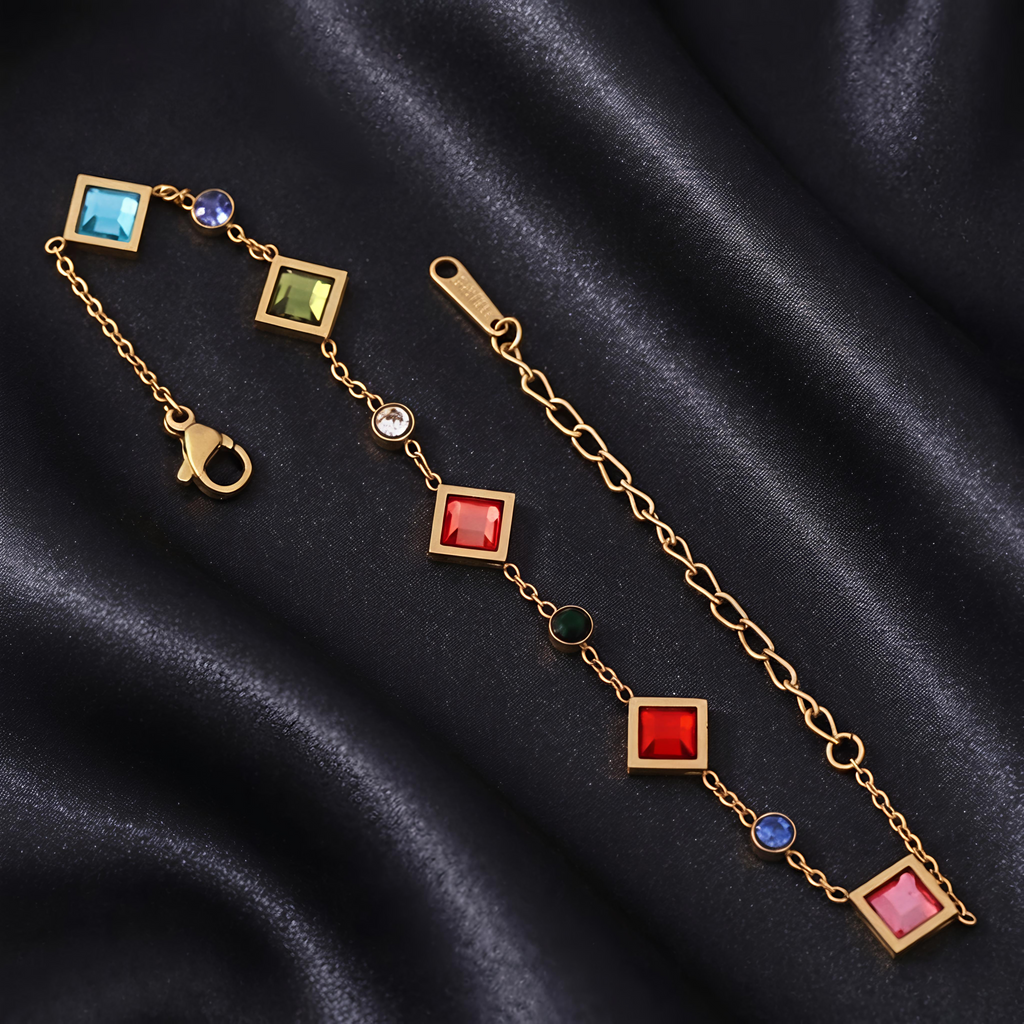 Close-up view of Tavisi Rainbow AD Stone Bracelet featuring multi colour AD stones, geometric design, premium gold plated stainless steel and anti tarnish finish.