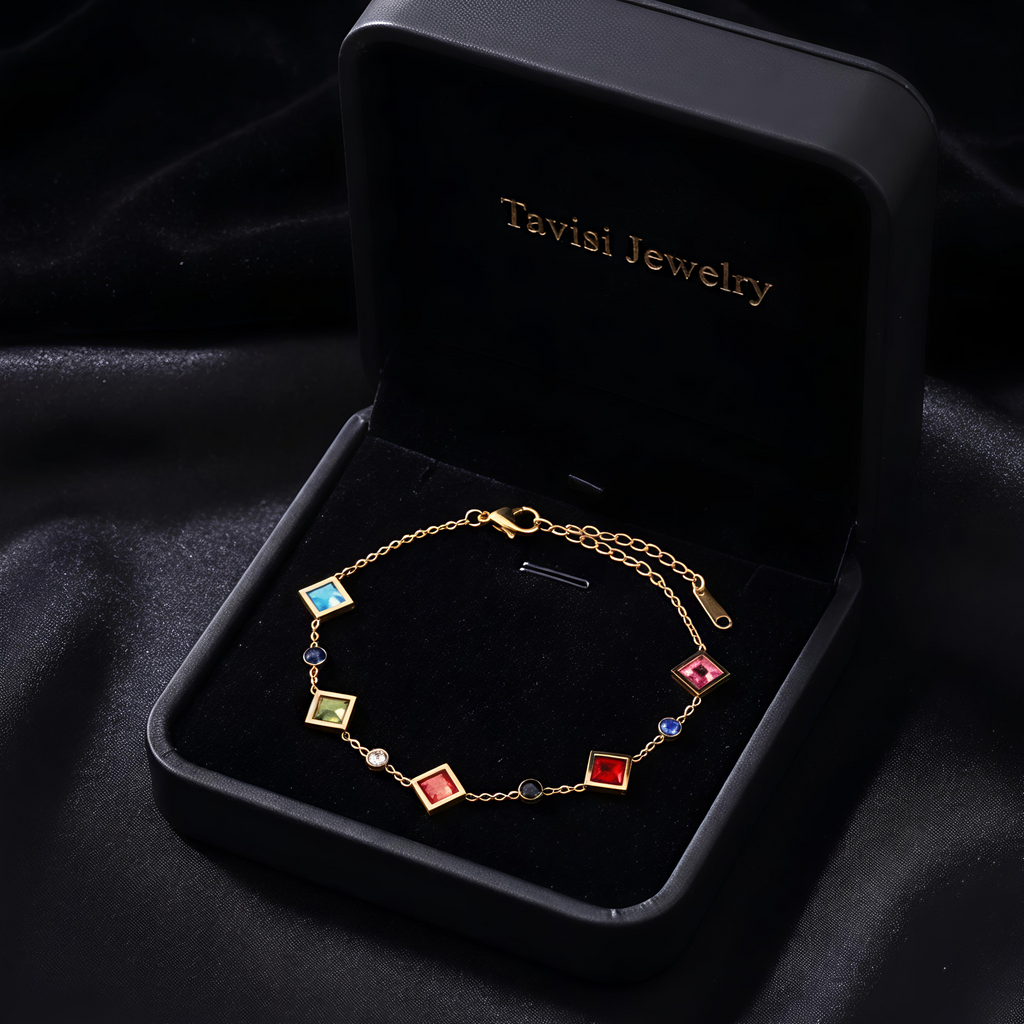 Tavisi Rainbow AD Stone Bracelet crafted in 316L surgical stainless steel with colourful American Diamond stones, 22K gold plating, waterproof anti tarnish finish and long lasting shine.