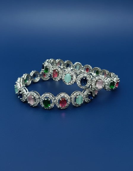 Front view of Tavisi Rainbow Luxe multicolor CZ silver polish bangle for women
