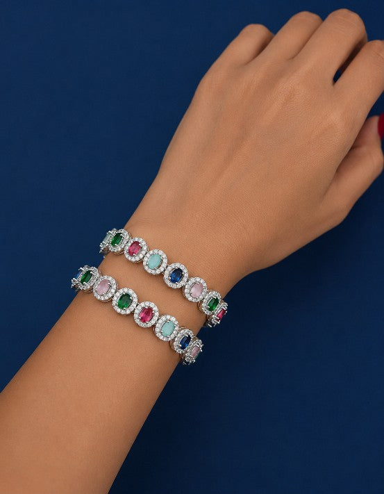 Tavisi Rainbow Luxe CZ Silver Polish Bangle for Women in Size 2.6 featuring sparkling white CZ stones, multicolor rainbow stones, premium silver polish finish, and anti-tarnish handcrafted design.