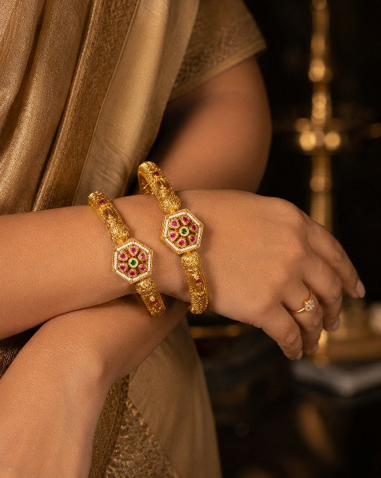 Tavisi Rajmohini Luxury Bridal Bangles with Ruby Colour Stones Pearl Details AD American Diamond Work Premium Gold Plated Brass Casting Jewellery