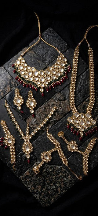 Tavisi Rajvi premium gold plated Kundan bridal jewellery set with choker long necklace earrings maang tikka and hathphool hand chains