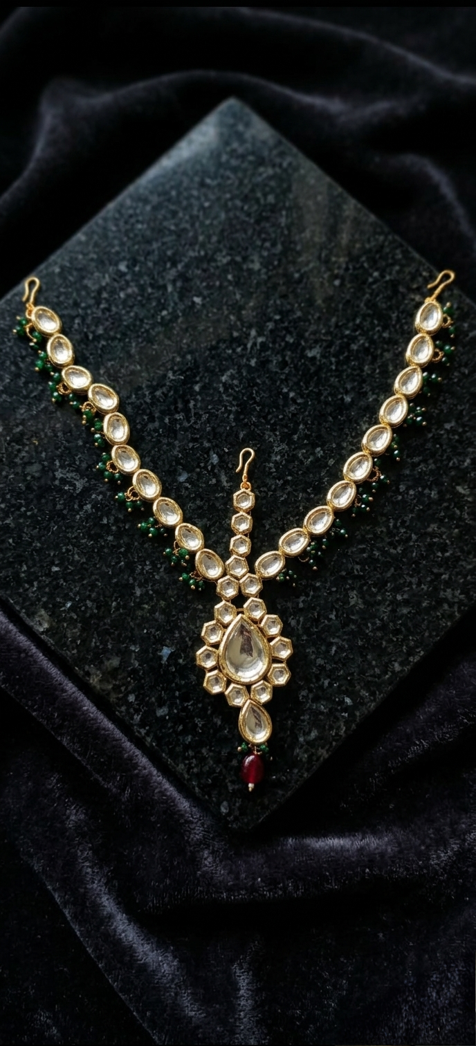Tavisi Rajvi premium Kundan maang tikka with gold plated finish for traditional bridal jewellery look