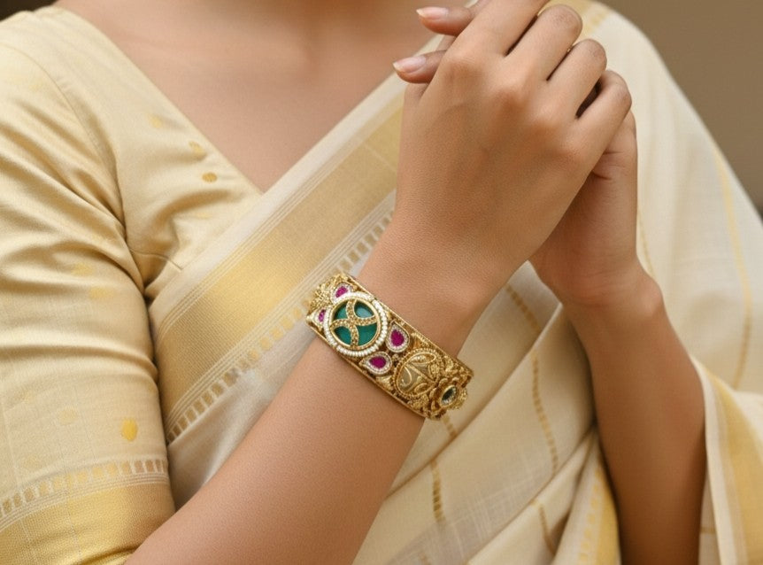Angle view of Tavisi traditional openable Kundan gold plated bangles with screw model design